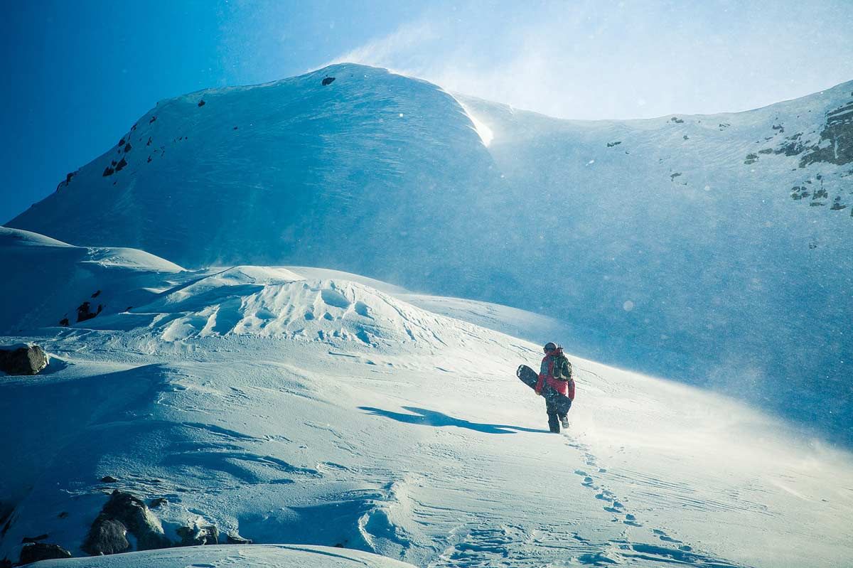 Splitboard Expeditions at the Arctic Circle, just before reaching a peak Splitboard Expeditions at the Arctic Circle, just before reaching a peak