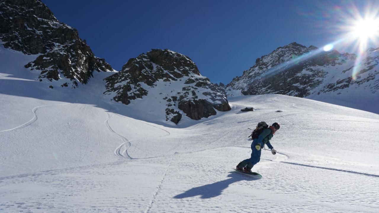 Earn your turns Splitboarding at Arlberg last turn of the run