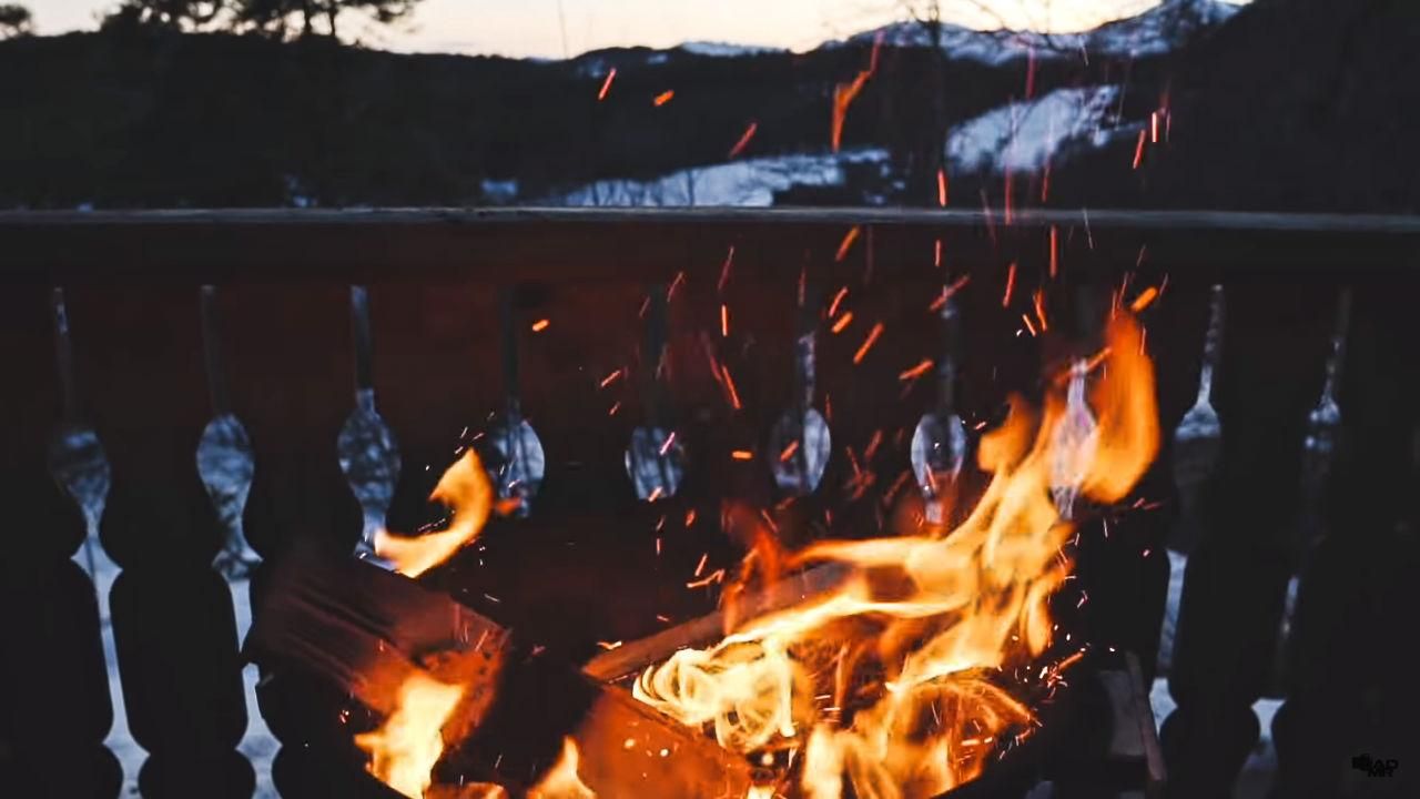 Fire warms your heart Jotunheimen fire at the fjord