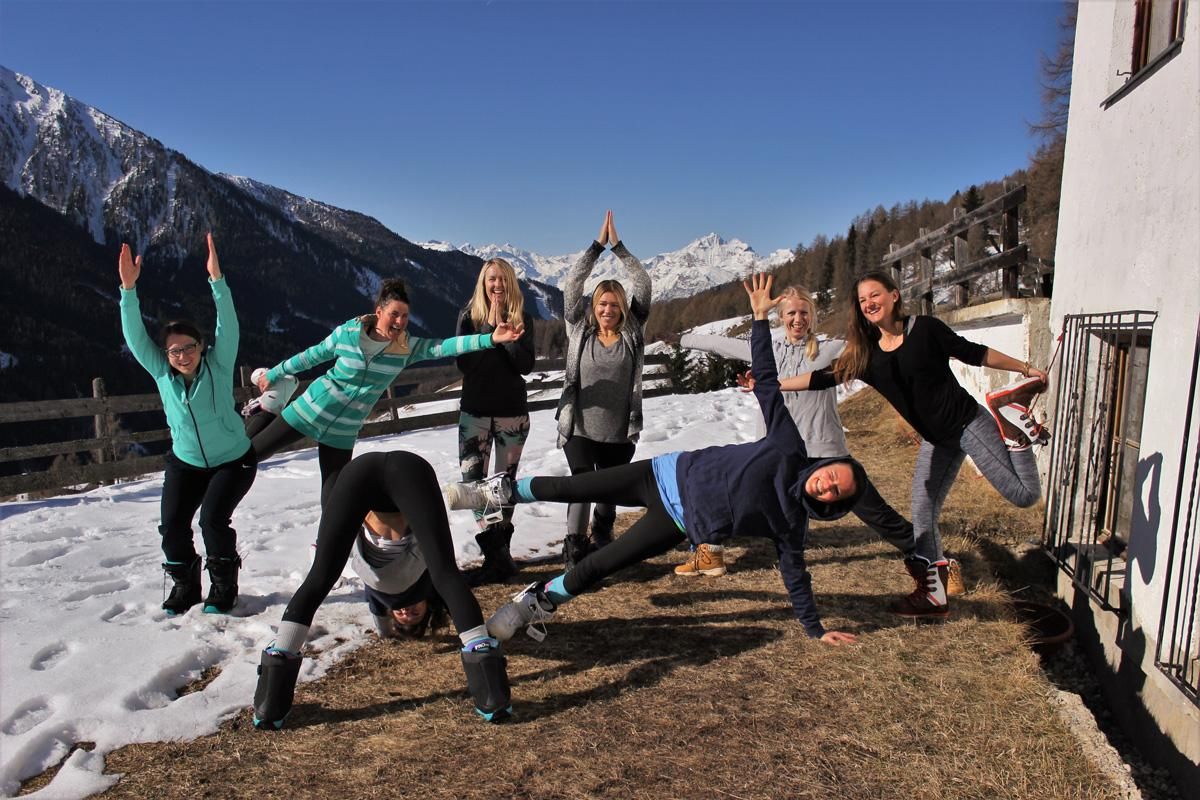 Girls Splitboard Camp Yoga posing